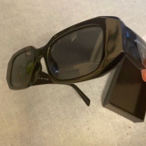 Woman’s Prada sunglasses